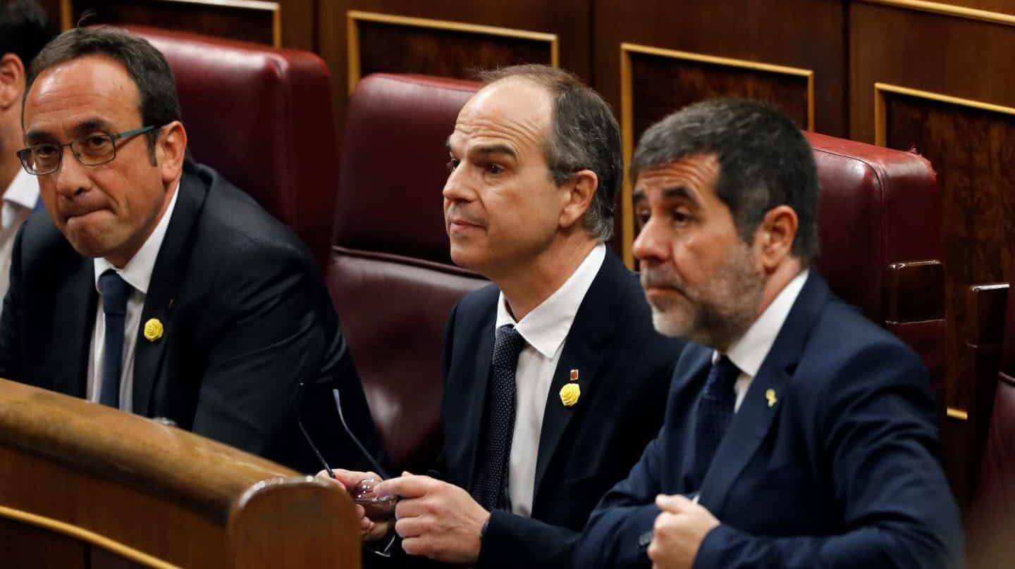 Los exconsejeros catalanes Josep Rull y Jordi Turull y el líder de ANC, Jordi Sànchez.