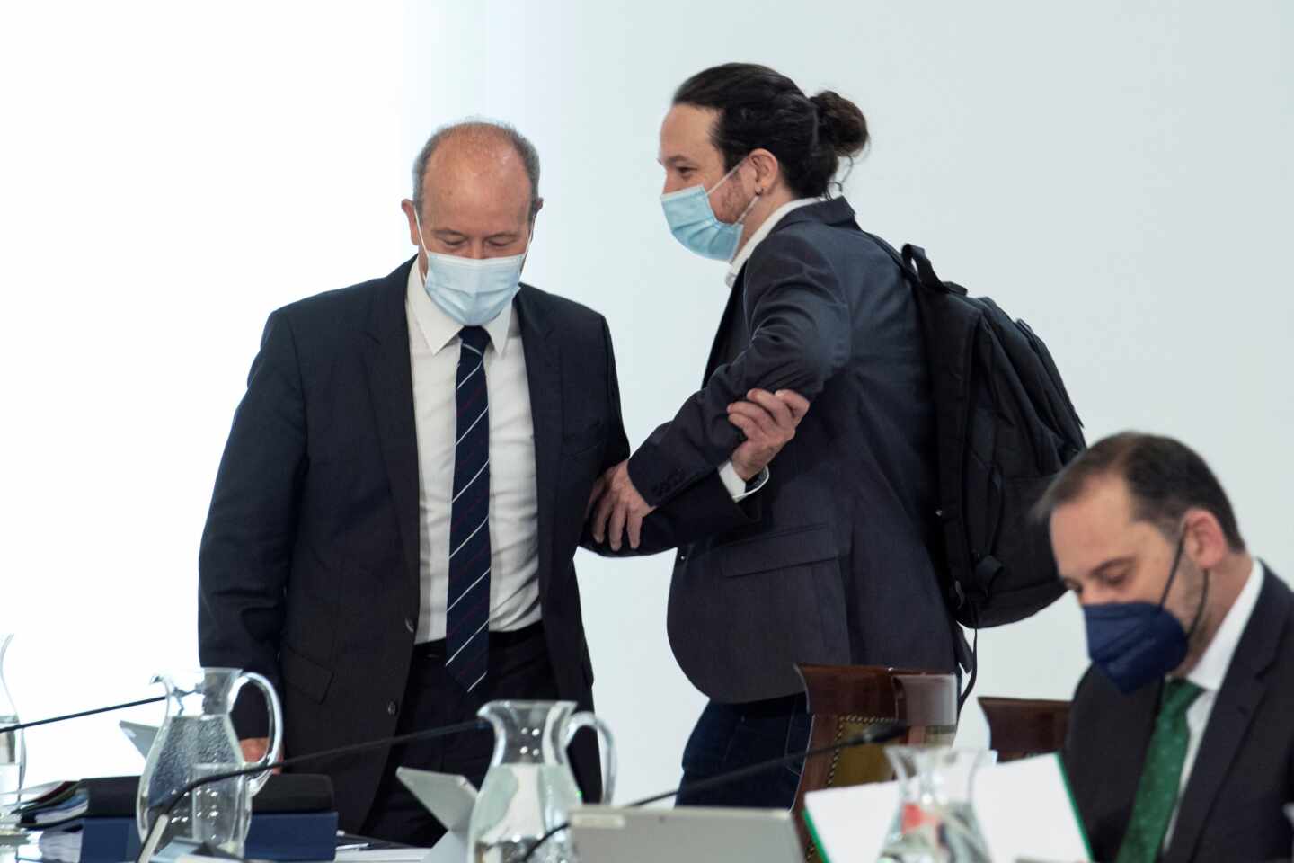 Juan Carlos Campo y Pablo Iglesias, en el Consejo de Ministros.