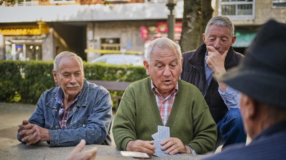 A group of pensioners play cards in Ourense, Galicia.